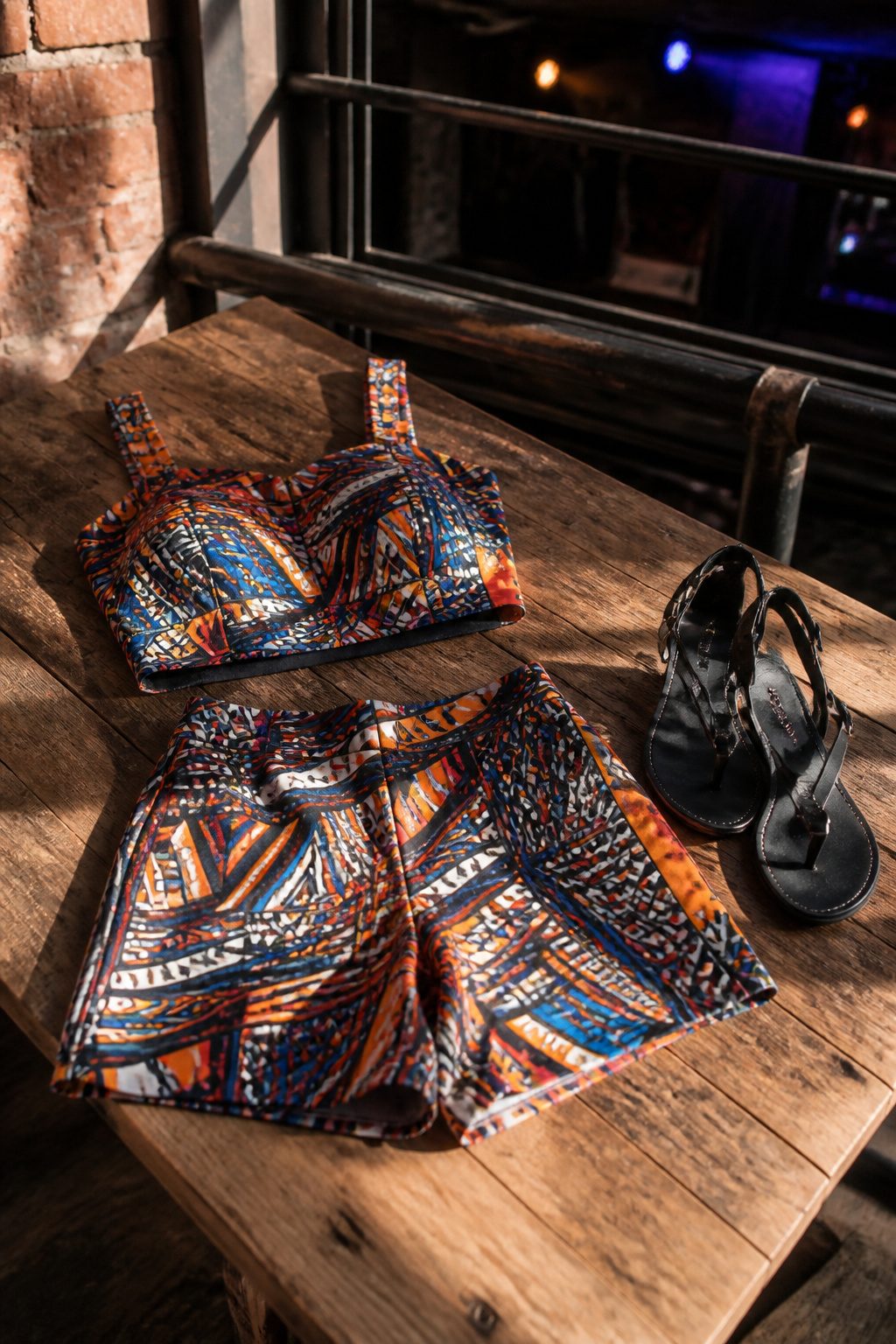 A cropped top and high-waisted shorts in a bold geometric pattern.