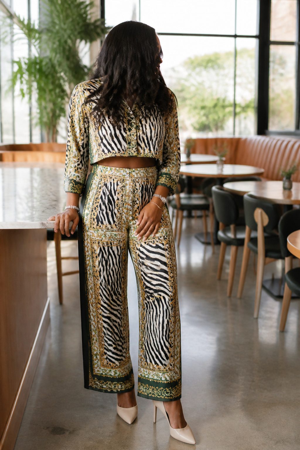 A matching silk set featuring a zebra print on a display.