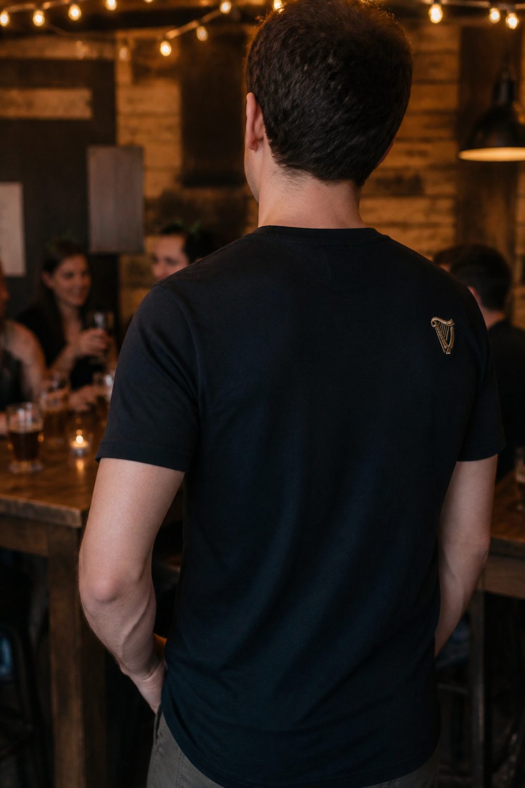 Guinness tee worn in a social setting with friends.